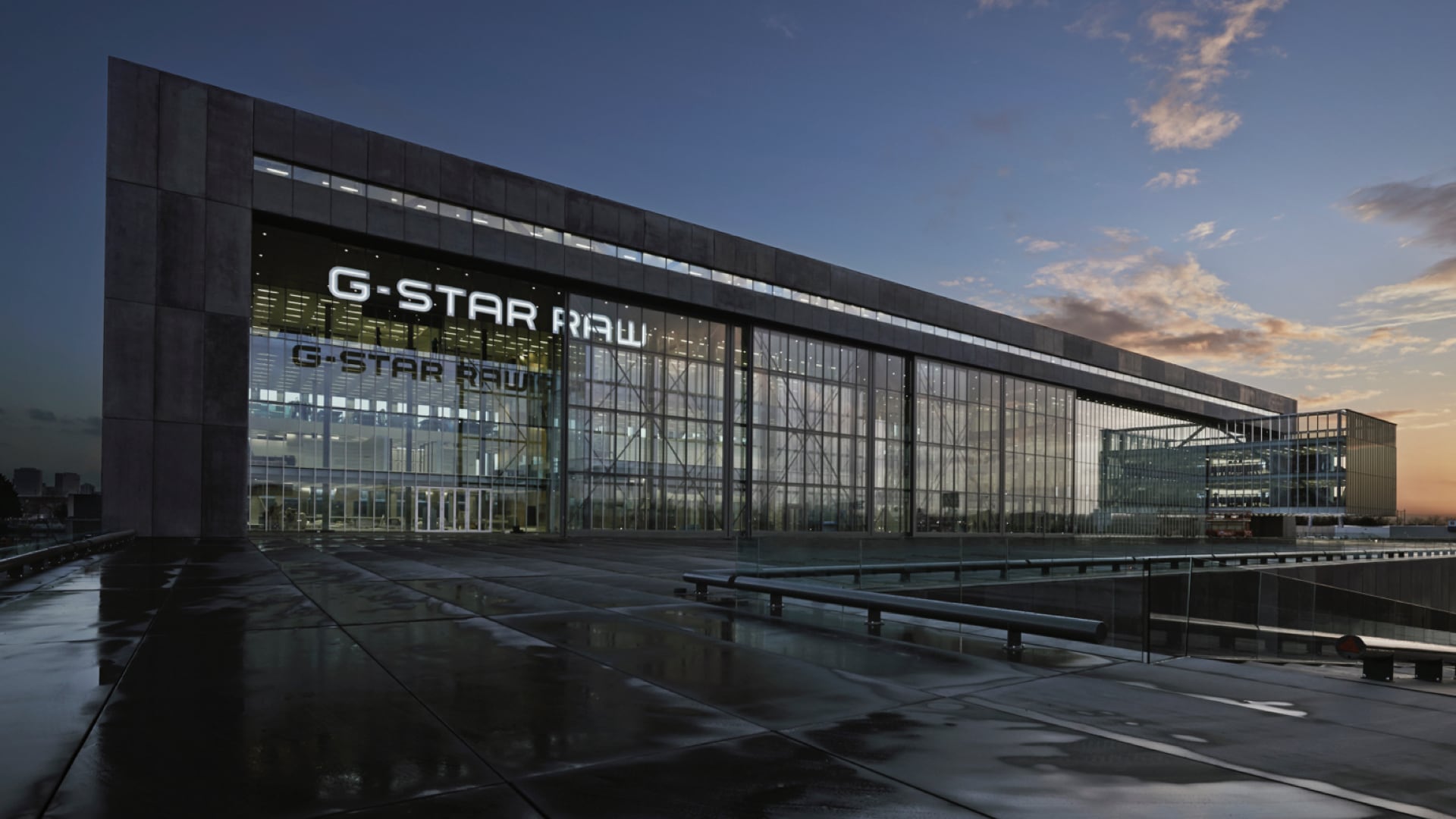 Outside a large G-Star RAW location that features floor to ceiling windows.